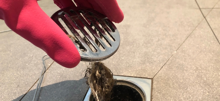 remove hair and debris from shower drain